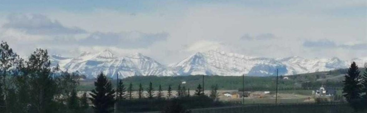 MOUNTAINS FROM FOOTHILLS COUNTY ALBERTA
