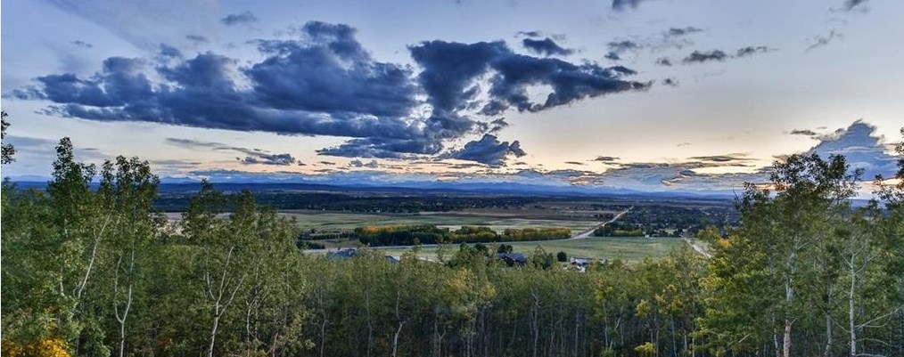 ROCKY MOUNTAINS FROM SPRINGBANK WEST BLUFF